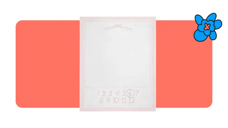 baby milestone blanket on orange and white background