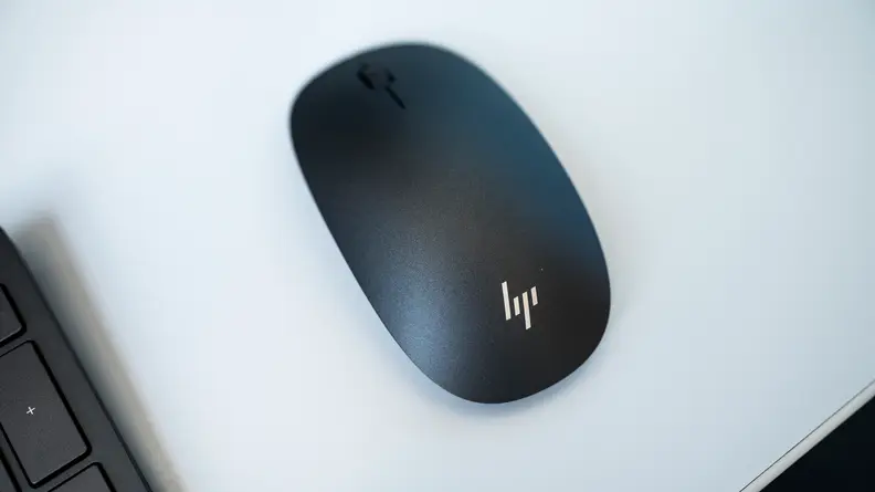 An overhead of the included wireless mouse