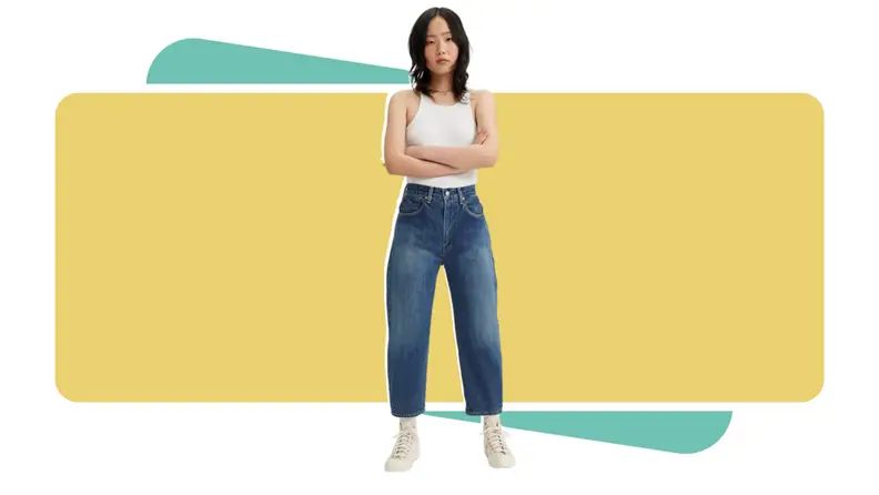 A model wearing blue jeans.