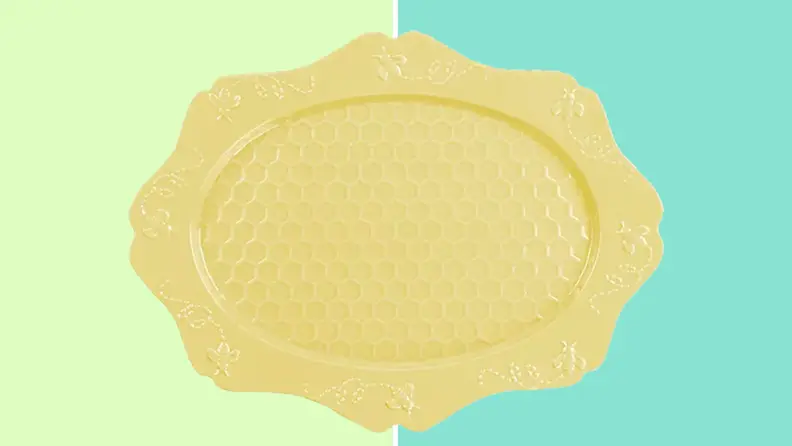 Yellow platter on a blue and green background