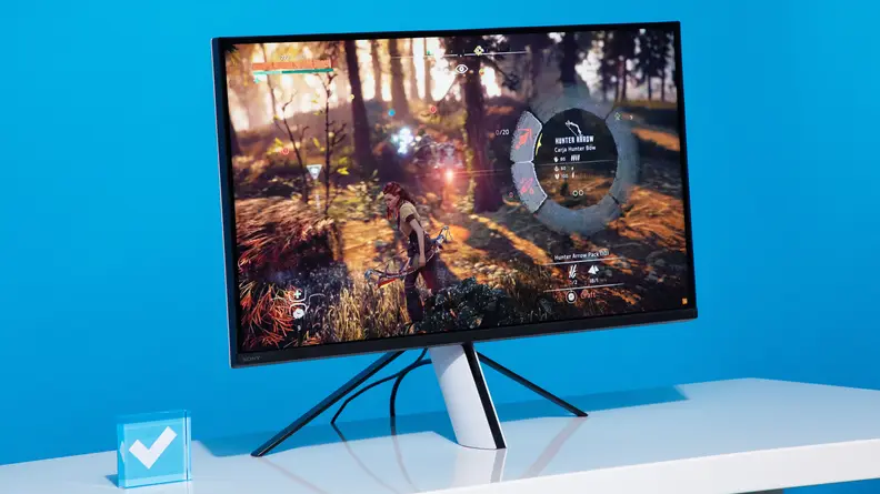 Sony Inzone M9 desktop monitor on top of white desk surface.