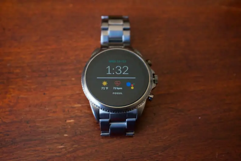 A smart watch with its wristband folded under itself