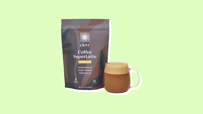 A bag of Clevr's Superlatte and a cup of coffee next to it.