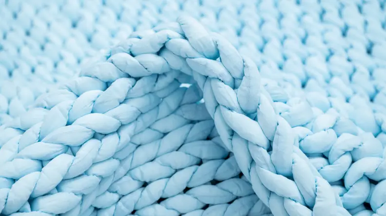 the knit texture of the nuzzie in detail