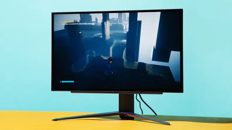 LG UltraGear OLED 27GR95QE-B gaming desktop on top of desk.