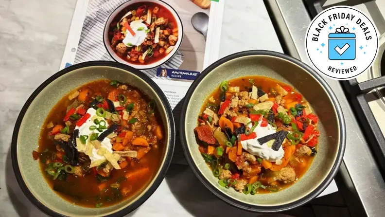Two bowls of Home Chef buffalo turkey chili with the Black Friday Deals Reviewed badge.