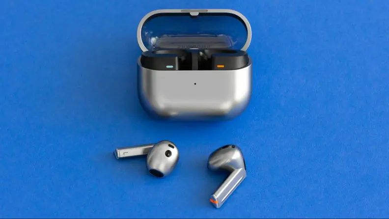 The Samsung Galaxy Buds3 outside their case atop a blue background.