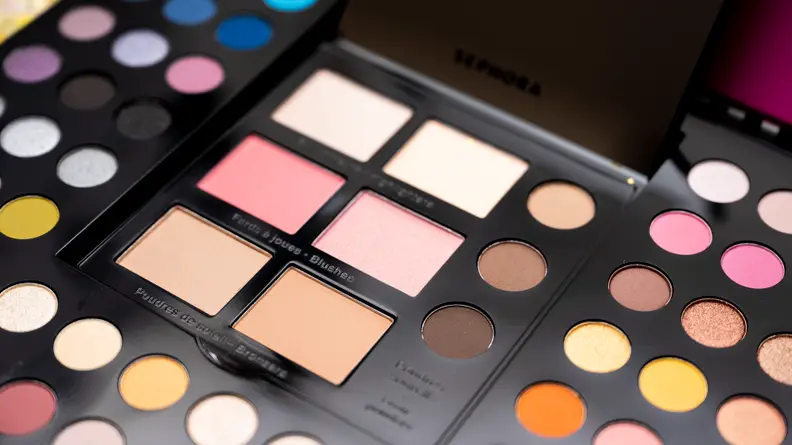 A closeup on a light, medium, and dark brown eyebrow powders.
