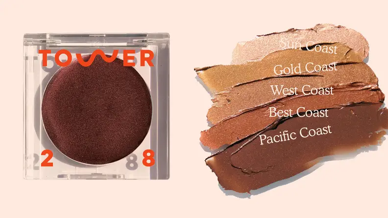 On the left: A dark shimmery shade of the Tower 28 Beauty Bronzino Illuminating Cream Bronzers sits on a pink background in its clear packaging. On the right: The swatches from every shade of the Tower 28 Beauty Bronzino Illuminating Cream Bronzer are smeared onto a pink surface.