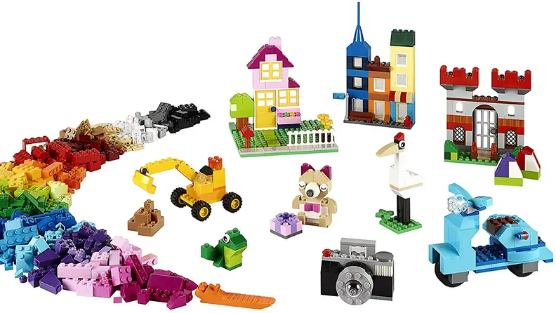 Lego blocks configured into houses, scooters, castles, and other shapes.