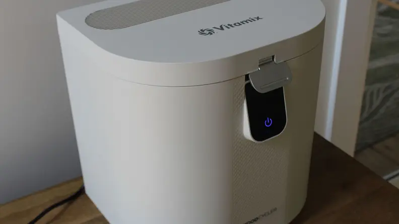 The Vitamix Eco 5 FoodCycler sitting on a table.