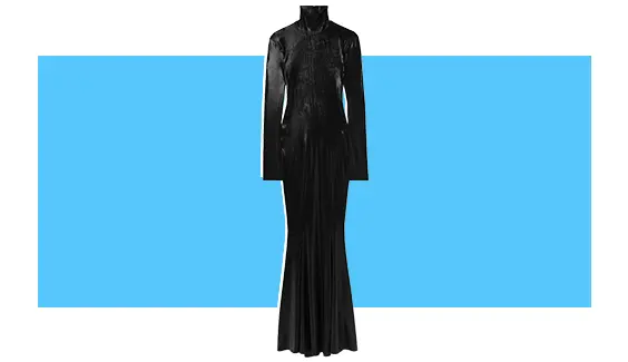 A black velvet maxi dress with long sleeves.