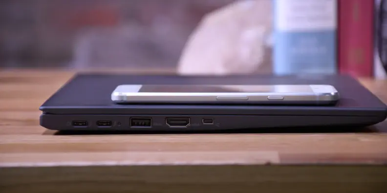 The X1 Carbon features a full array of ports, but it's still barely thicker than your phone.