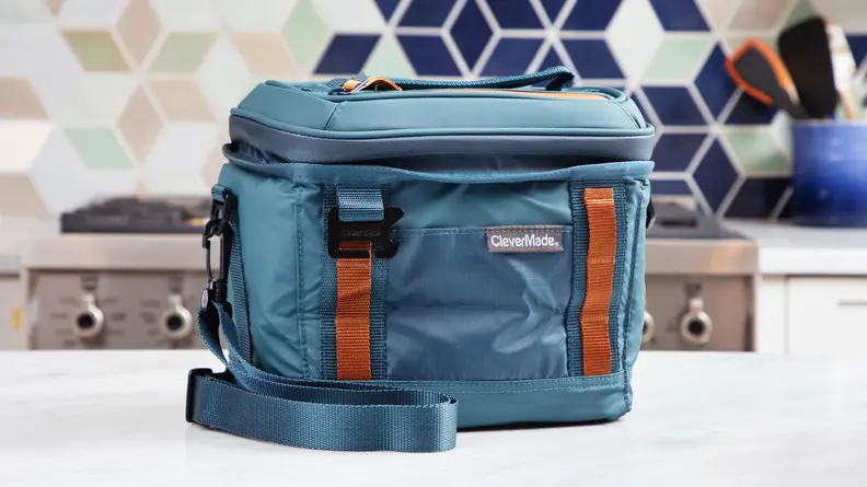 Blue CleverMade Pacifica Pro lunch bag on a kitchen counter.
