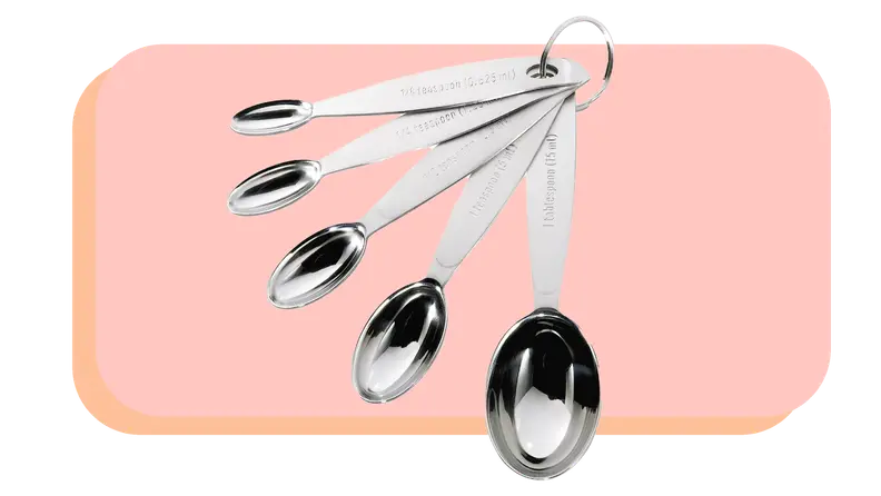 Stainless steel oval-shaped measuring spoons looped together by key ring.