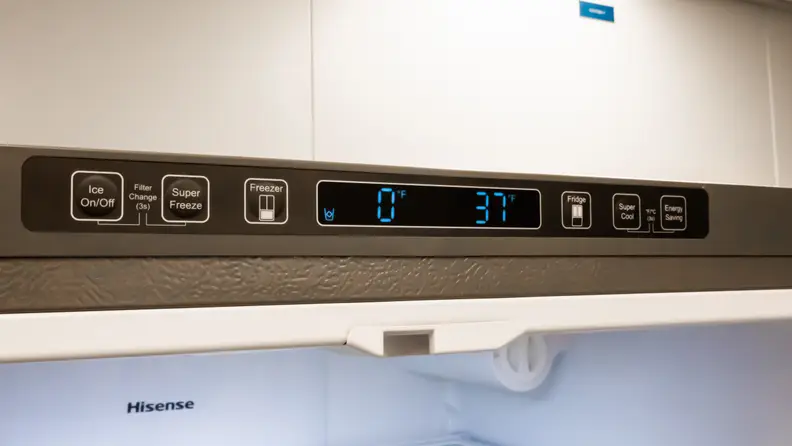 The Hisense HRF266N6CSE French-door refrigerator's control panel, located at the top center of its frame. You'll need to open both doors to access it.