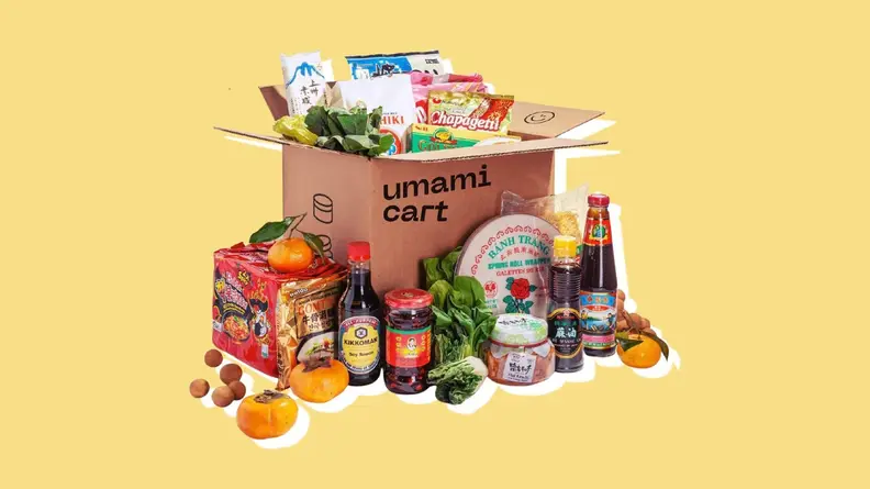 Product shot of assorted Umamicart grocery products inside of box packaging.