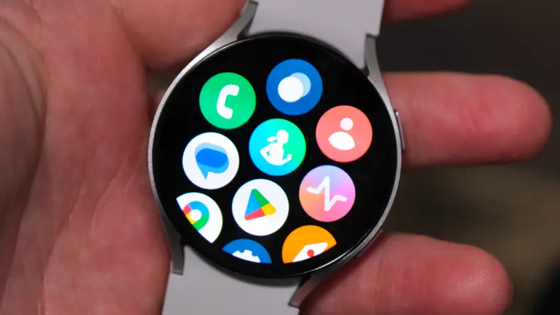 A close up of the Samsung Galaxy Watch 6, featuring an app menu on the screen.