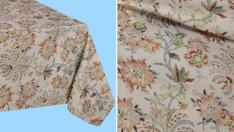 Product shot of beige-colored floral printed tablecloth.