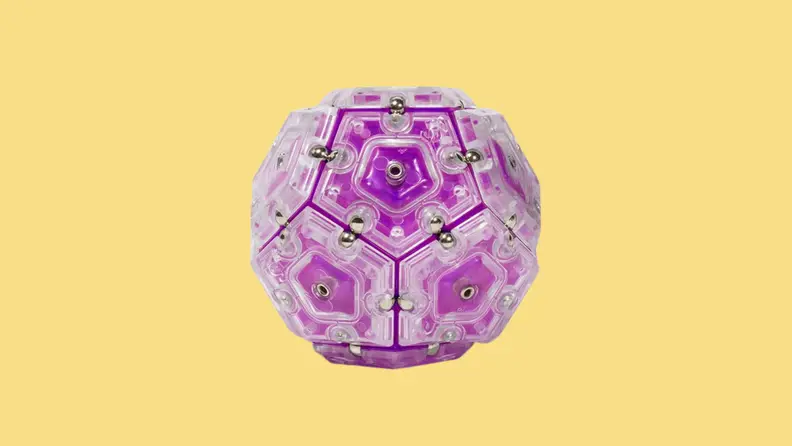 A Speks Geode Magnetic Fidget in the color purple.