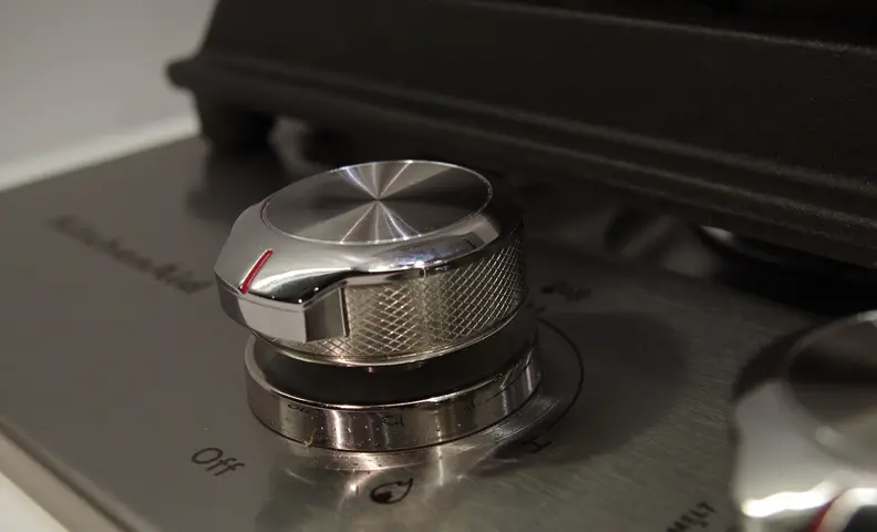 A knurled knob with a spin finish