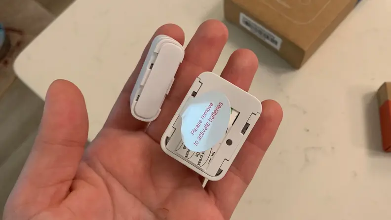 The backside of a SimpliSafe entry sensor.