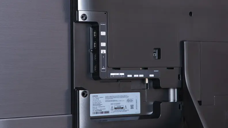 Up close view of the back of the Samsung S90C QD-OLED TV cord and USB connections.