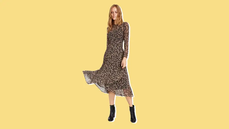 A floral-printed long sleeve dress from Tommy Hilfiger against a yellow background.
