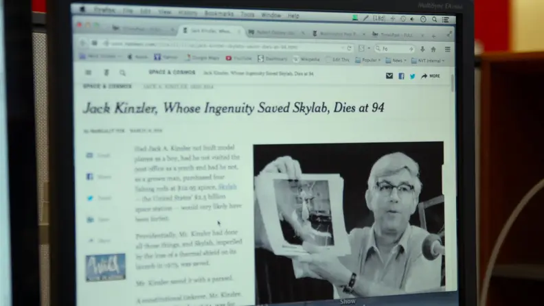 An obituary displayed on a computer screen