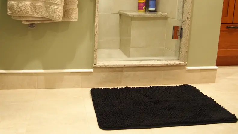 A stylish bath mat can brighten up your space.