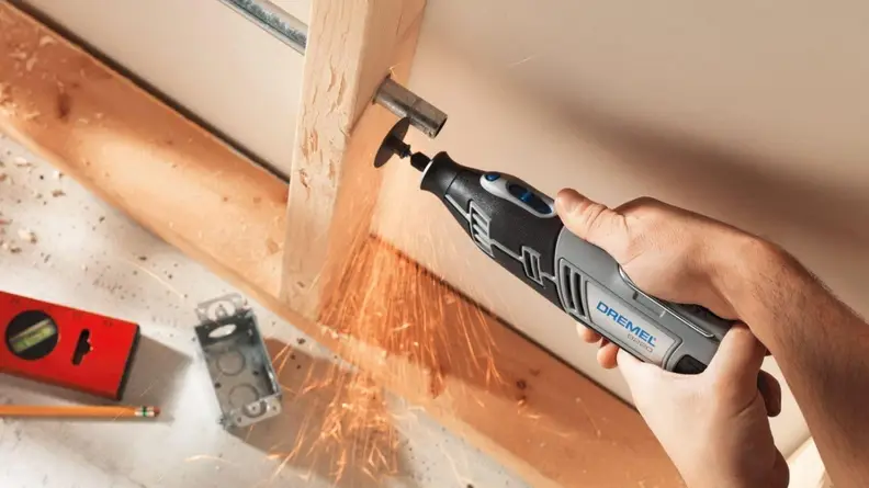Person using a dremel 8220 our choice for best cordless dremel tool