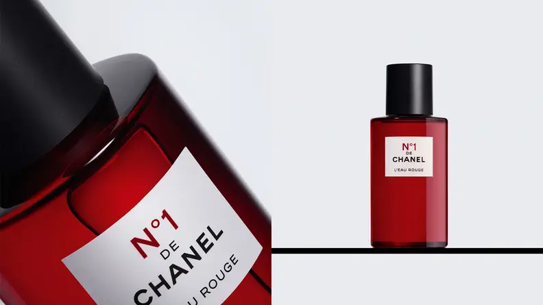 On the left: A closeup on a red transparent fragrance bottle with a white square label on it. On the right: A red transparent bottle of fragrance standing on a shelf.