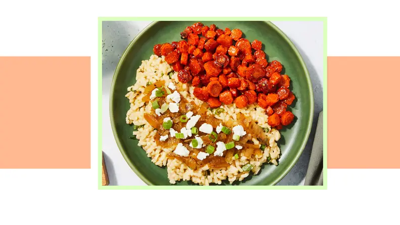 prepared meal with carrots and grains