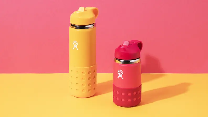 A gold and a red HydroFlask