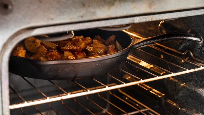 Cast iron pan inside an oven