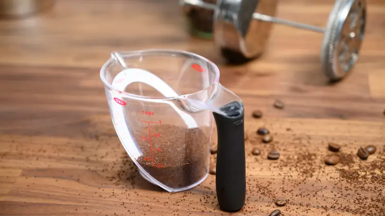 Use a burr grinder to coarsely grind the beans.