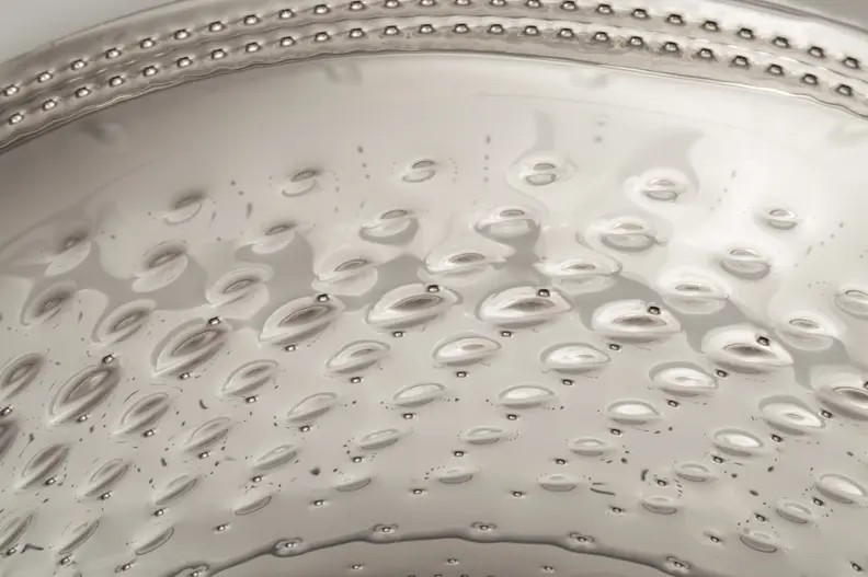 The steel texture helps clean your clothes without tearing them.
