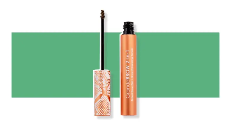 Grande Cosmetics brow gel on a green background.