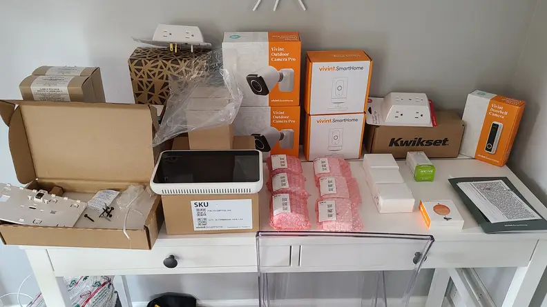 Vivint security product boxes on table