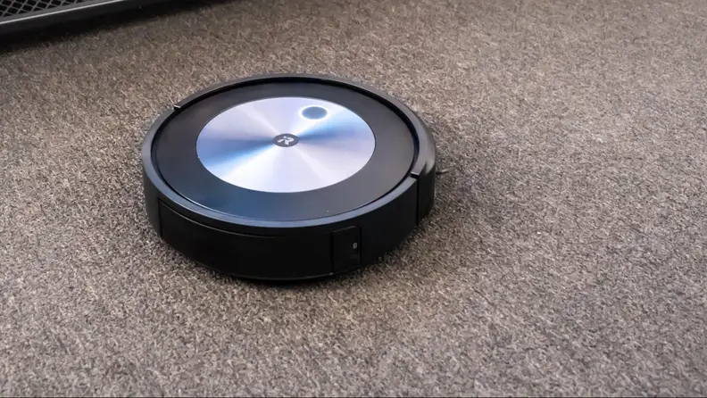 The iRobot Roomba j7+ on carpet.