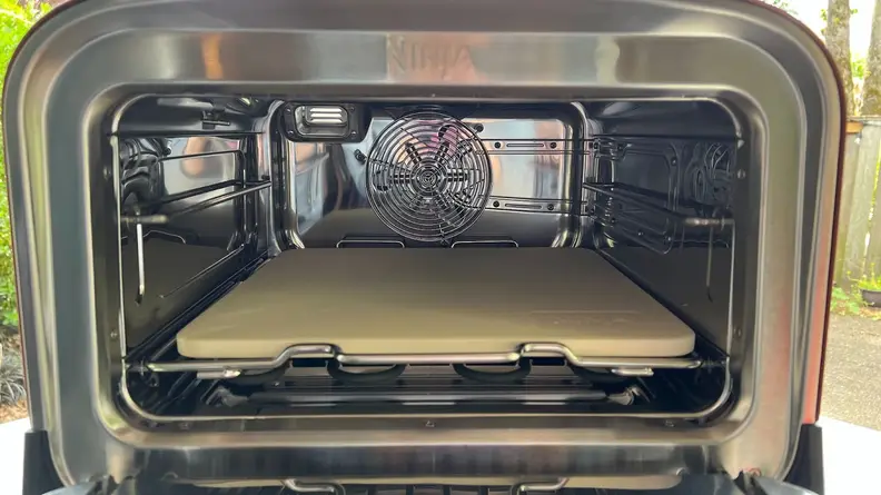 Interior cooking chamber on the Ninja Woodfire Outdoor Oven.