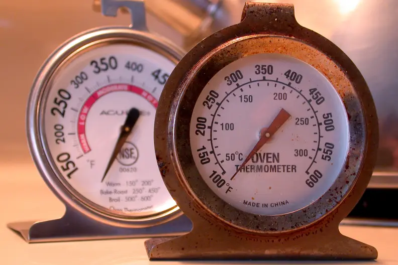 two oven thermometers