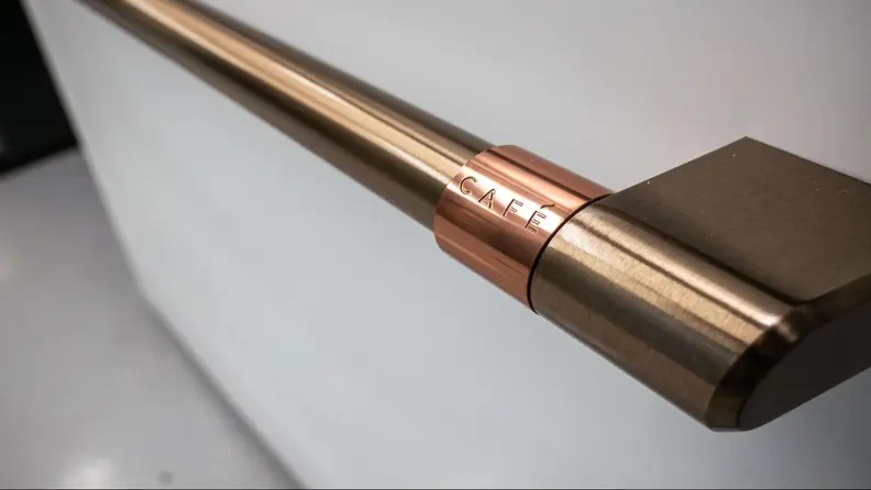 Close-up shot of the bronze handle bars.