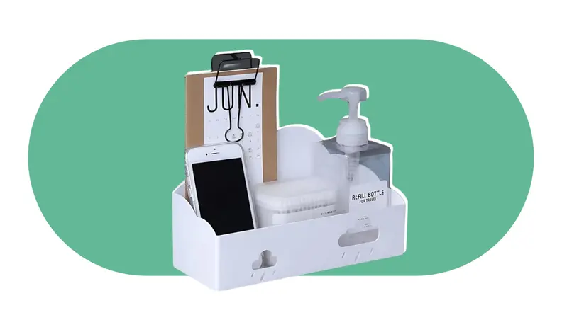 Small organizer holding smartphone, a refillable bottle, a small clipboard and a container of cotton swabs.