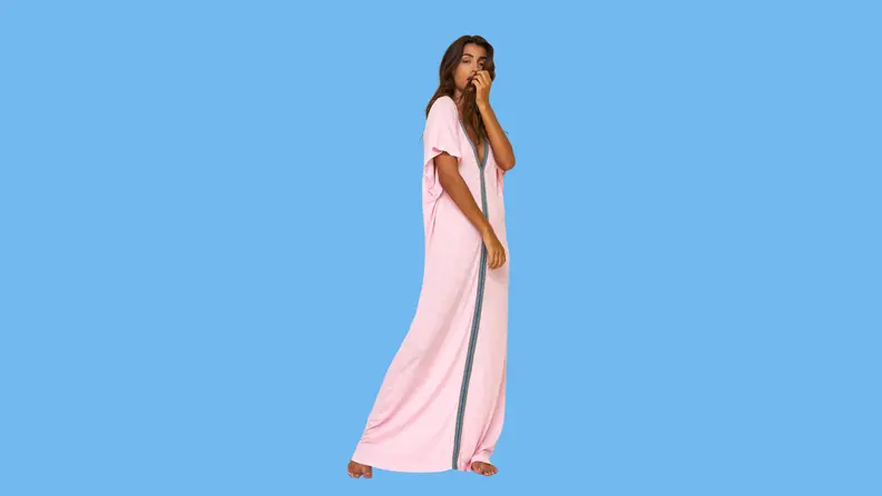 An Abaya-style coverup with piping details.