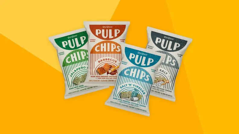 Four bags of Pulp Pantry chips against a yellow background.
