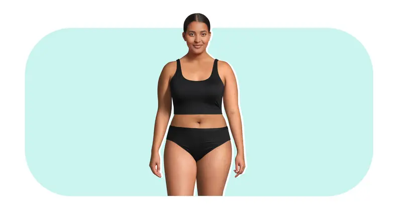 Model wearing black Lands’ End Comfort Knit Bra and black underwear.