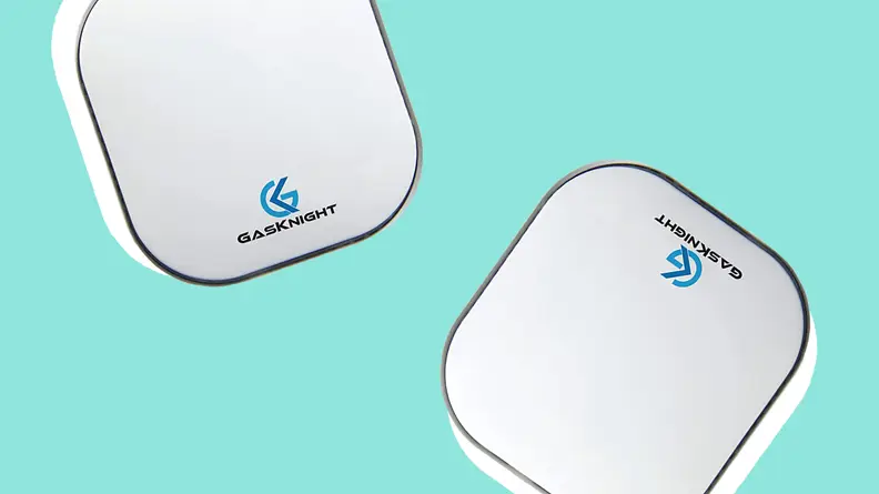 Two GasKnight natural gas detectors against a blue background.