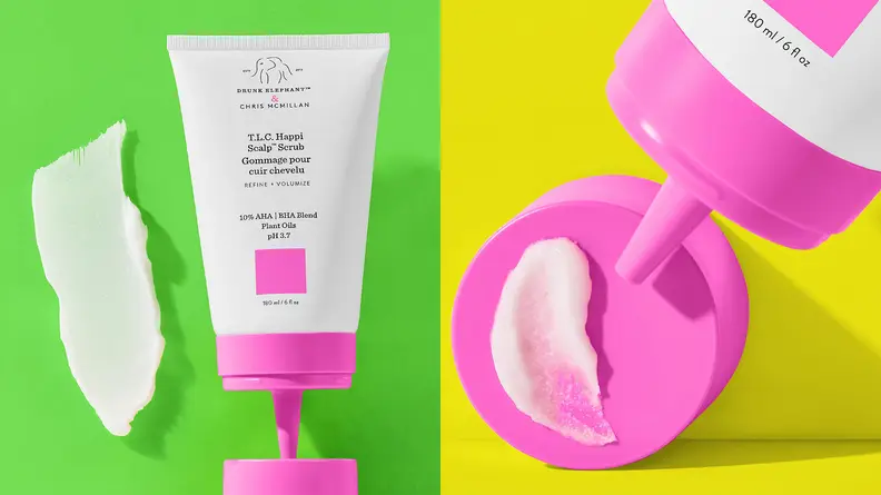 On the left: A white and pink Drunk Elephant squeeze bottle. On the right: The tip of the squeeze bottle hovering over a swatch of white formula.