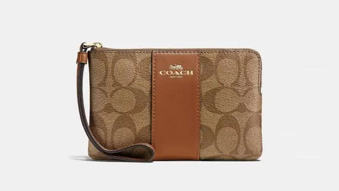 A coach corner-zip wristlet